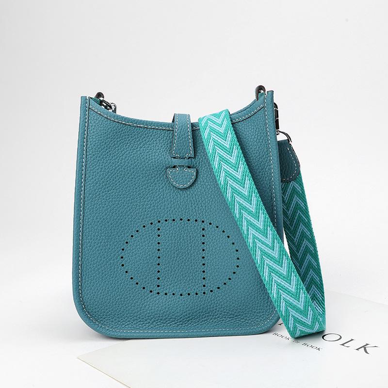 Factory wholesale first layer togo cowhide bucket bag women's bag lychee pattern hollow single shoulder crossbody bag hollow design