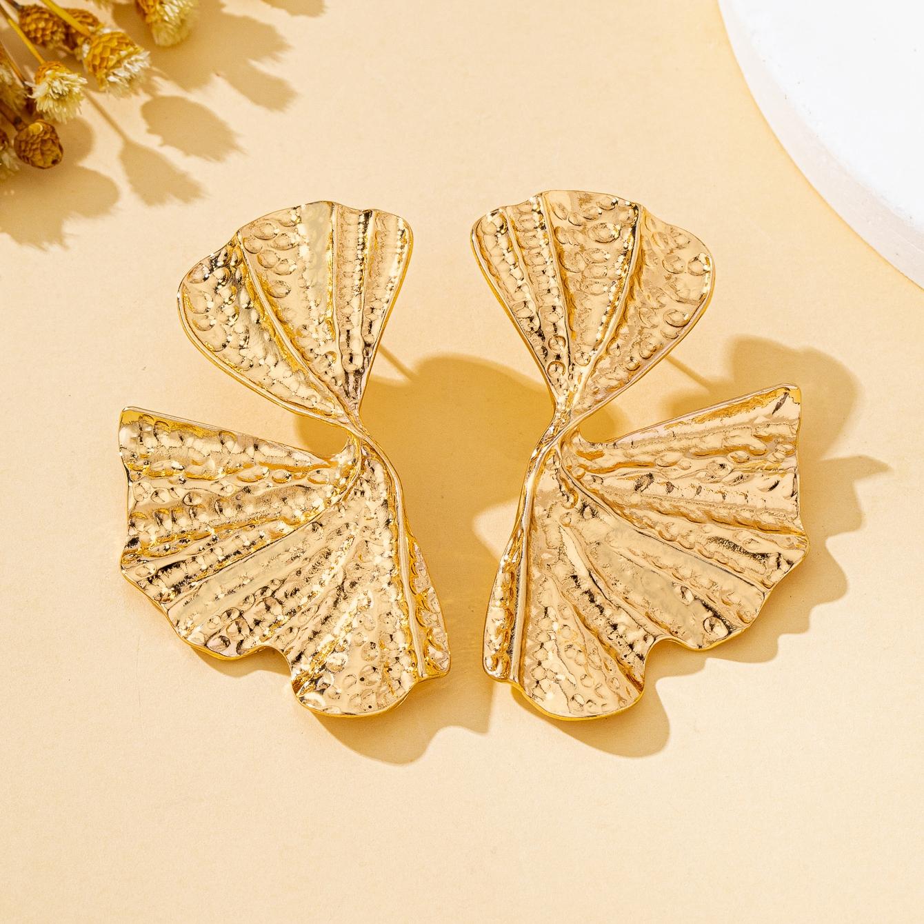 

A Pair of Women s Earrings with a Vintage High-End Feel, Featuring Irregular Leaf and Petal Designs, Suitable for Daily Wear and Vacation