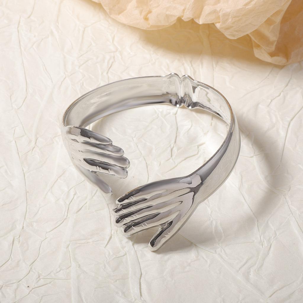 Niche unique design sense, two hands embrace personalized shape, open metal bracelet, irregular curved women's models