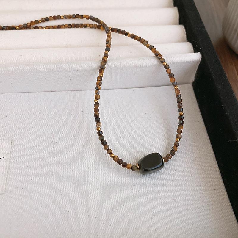 Autumn and winter retro flower round artificial tiger's eye stone necklace sweater chain light luxury sweater necklace