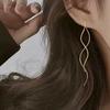 Silver Wave Thread Earrings: Elegant, Versatile French Fashion for High-End, Modern Women
