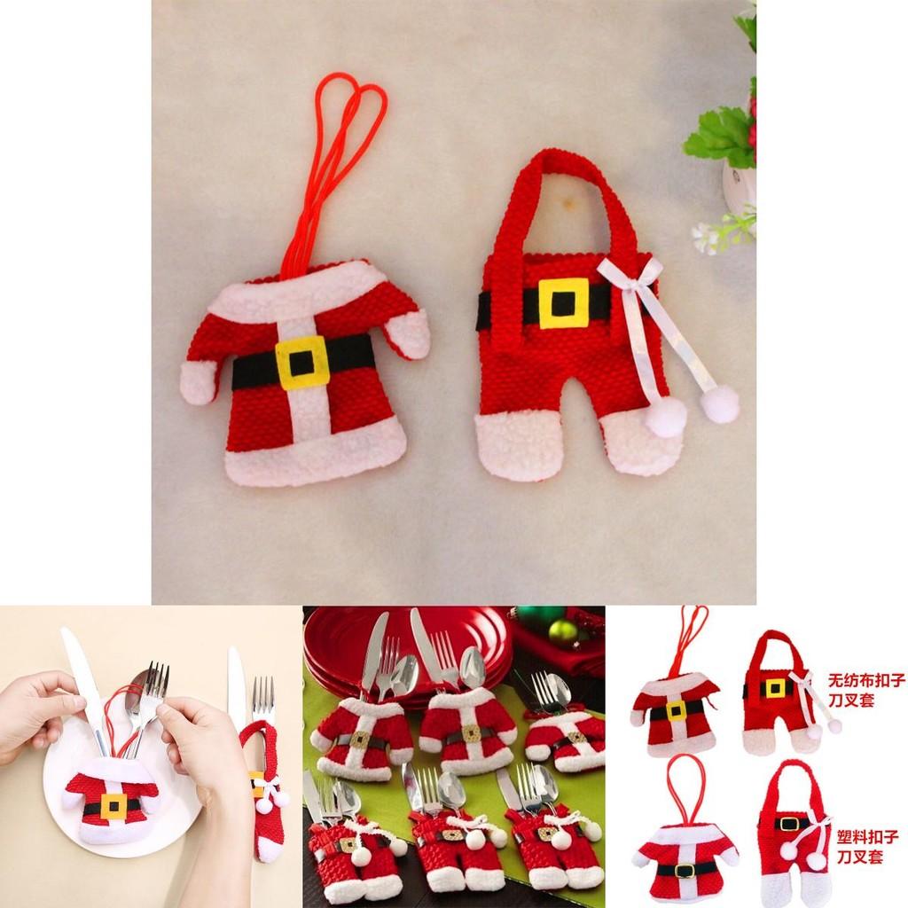 Festliche Weihnachts-Tischdekoration mit charmanten Weihnachts-Besteckhaltern und Mini-Outfits