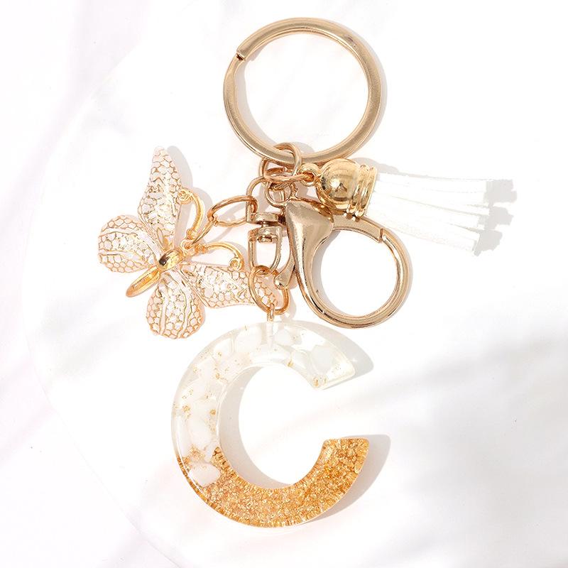 Chic White Tassel Letter Keychain with Resin Epoxy Pendant - Stylish Ornament for Bags
