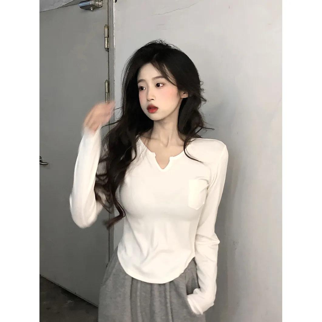 

Spring and Autumn V-neck long-sleeved T-shirt women s curved hem irregular design sense slim bottoming shirt pure desire wind shoulder top S белый