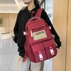 Fashionable casual large capacity multi-pocket labeling contrast color school bag for men and women students 23 autumn and winter new backpack