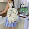 Schoolbag Crayon Small New Full Print Backpack Female Cute Cartoon Student Schoolbag Large Capacity Light Commuter Backpack