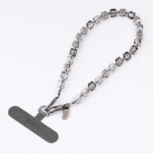 Uniq Coehl Candy Gem Handstrap           Uniwersalny Sznurek Do Telefonu Na Rękę Srebrny/Silver Sparkling