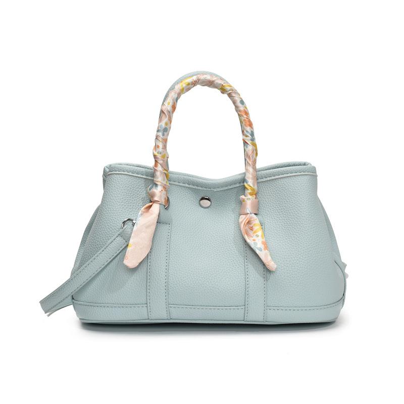 High-end trendy fashion hand-carried bucket bag women 2025 new simple casual shoulder bag small fresh messenger bag