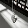 In 2008, there were fish, koi, hollow pendants, and sweater chains.