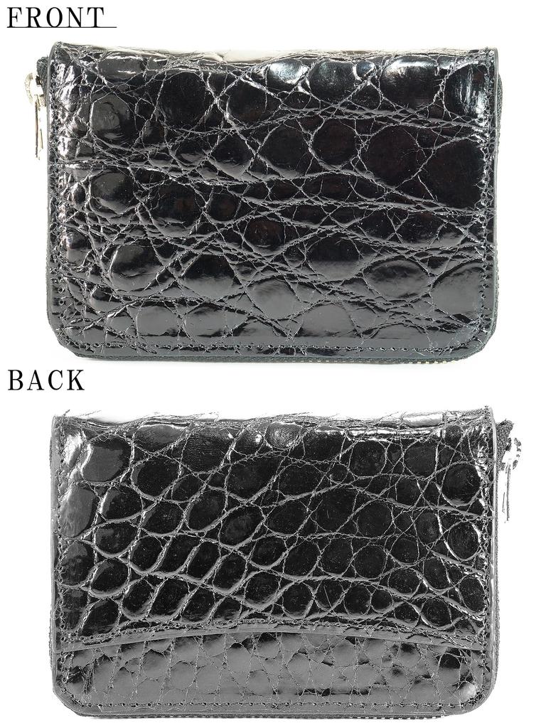 Dieses Münzfach aus emailliertem schwarzem Krokodilleder wird in Japan aus echtem japanisch gegerbtem Leder hergestellt.. Es kompakt, klein und schlank und leicht.