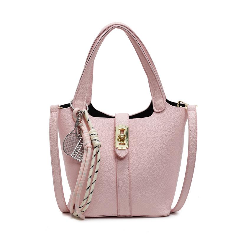 

This year s popular simple Ou Ruofeng lychee pattern hand carrying bucket bag fashion temperament versatile high sense messenger women s bag