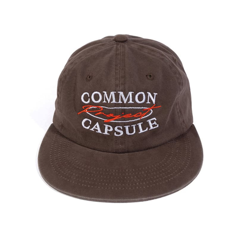 

commoncapsuleproject Oval Logo 6-Panel Flat Visor Cap (Brown) BROWN_FREE