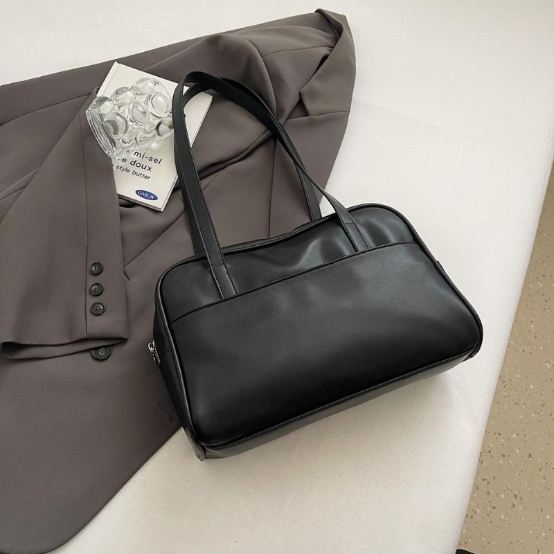Simple bowling bag women's new large-capacity retro commuting design single shoulder pillow bag