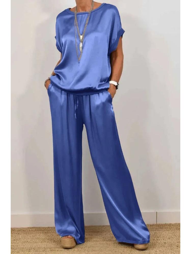 Set Top Bianco a Vestibilità Rilassata e Pantaloni a Gamba Larga a Vita Alta