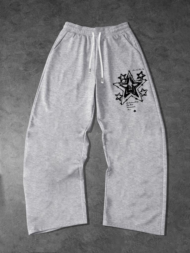 Pánské tepláky s kapsami a stahovací šňůrkou - Široké volné tepláky na běhání, dráhu, jógu, joggery