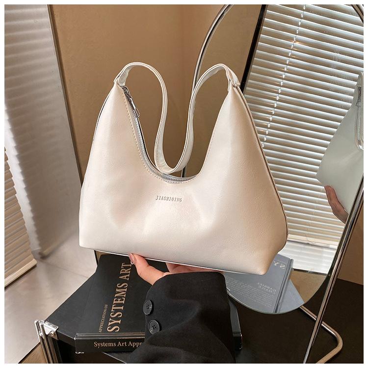 Niche design underarm bag women's spring 2025 texture dumpling bag is popular this year, single shoulder commuter underarm bag