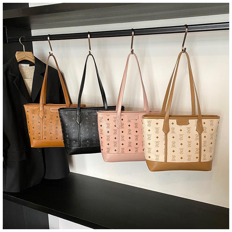 Tote bag women's large capacity 2025 new summer versatile simple shoulder bag casual senior sense work commuter bag