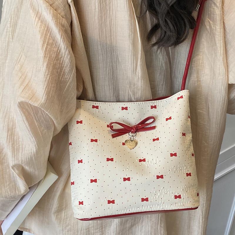 Korean Niche Bow Women's Bag 2025 New Summer Shoulder Armpit Bag Fashionable High-value Portable Bucket Bag
