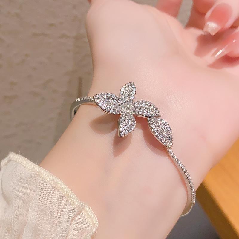 Niche four-leaf flower butterfly open zircon bracelet bracelet versatile hand jewelry women