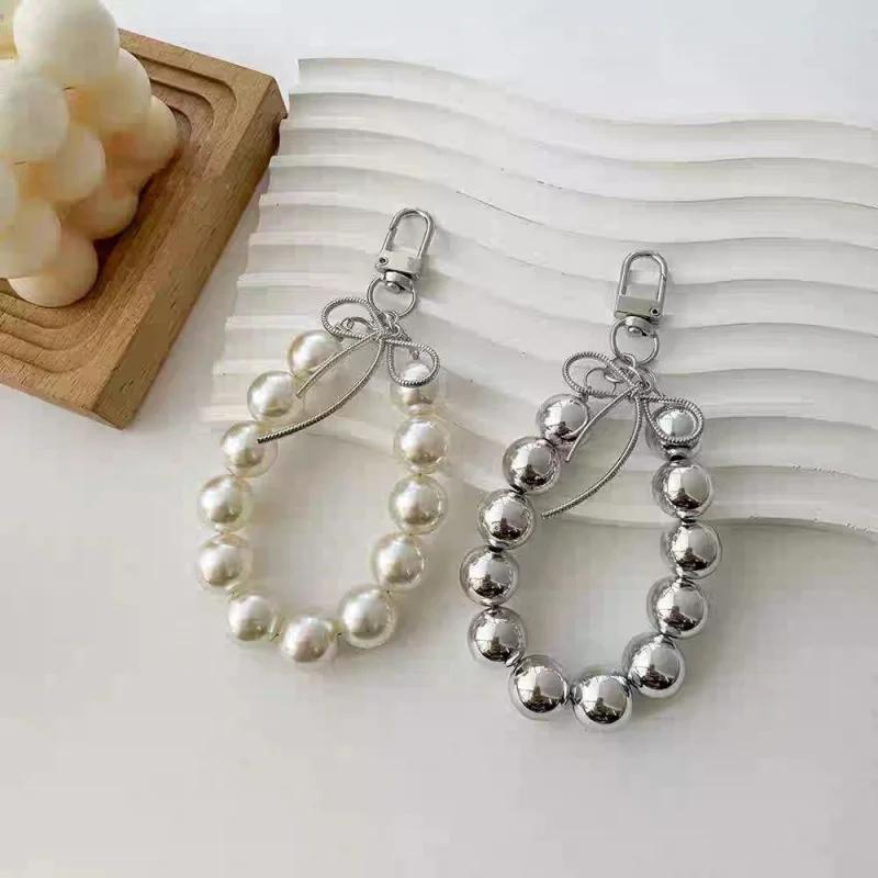 Advanced feeling electroplated silver pearl mobile phone strap, sweet bow headphone case, bag, car key pendant
