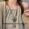 Retro pendant, ethnic style ceramic butterfly bell necklace, women's new trendy long sweater chain with accessories