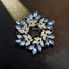 Elegant Rhinestone Animal Brooch: High-End Flower Design for Women's Coats and Accessories