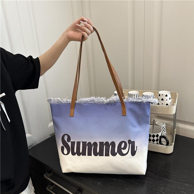 New large-capacity fringed bag beach bag women's shoulder tote bag is now popular casual bag popular women