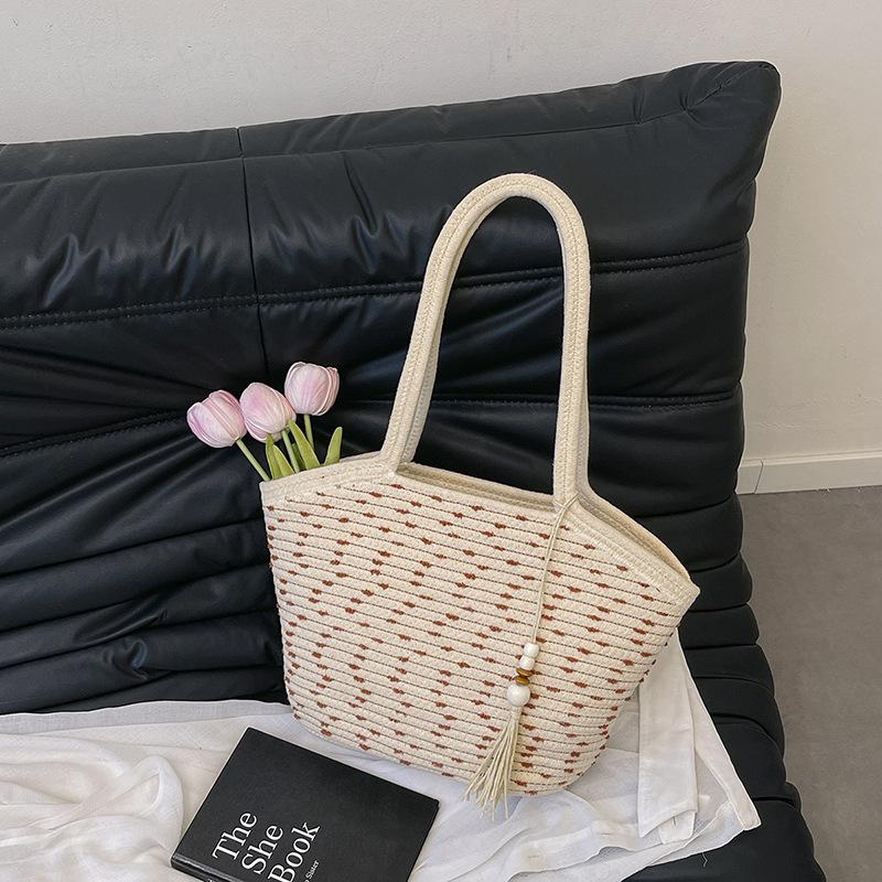 2025 summer new temperament literary large-capacity woven bag multi-functional foreign style portable underarm beach bag