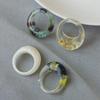Transparent Resin Ring with Dried Flowers: Elegant, Versatile, European and American Fashion Design