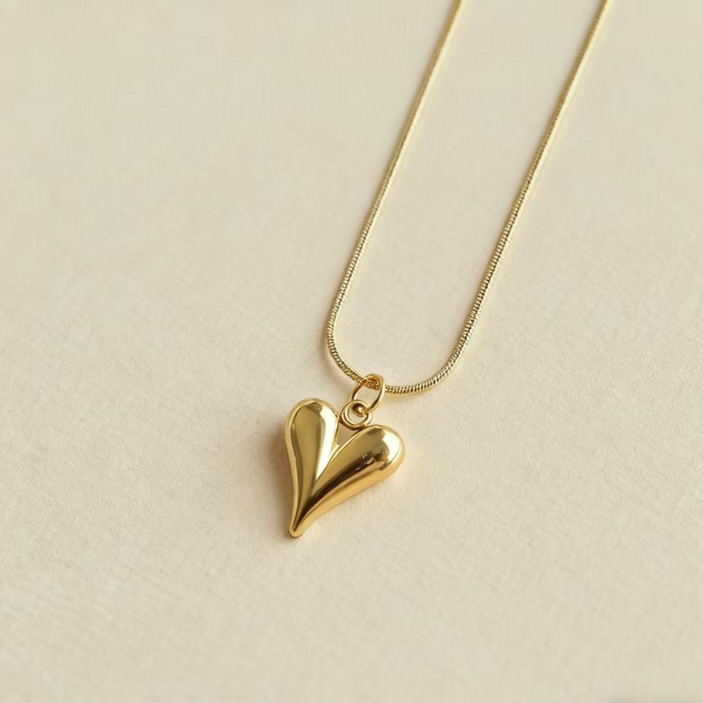 Elegant Double-Layer Heart Pendant Necklace: European & American Design, Fashionable Clavicle and Snake Chain for Women