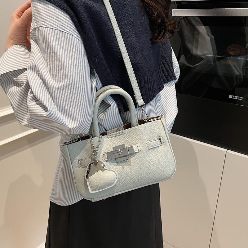 Premium Sense Hand Trage Tasche Damen Neue Mode Einfache Schulter Umhängetasche Nische Pendler Tasche