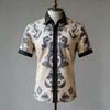 Short-sleeve linen shirt with vintage ornate floral print, casual wear.