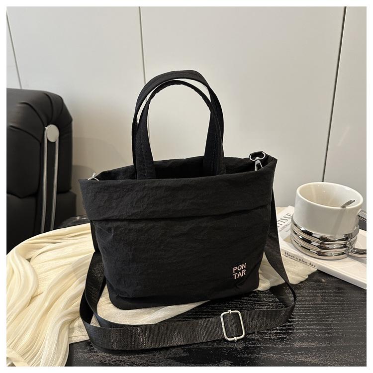 Fresh and sweet girl simple casual going out large capacity solid color spring hand carry shoulder small messenger bag