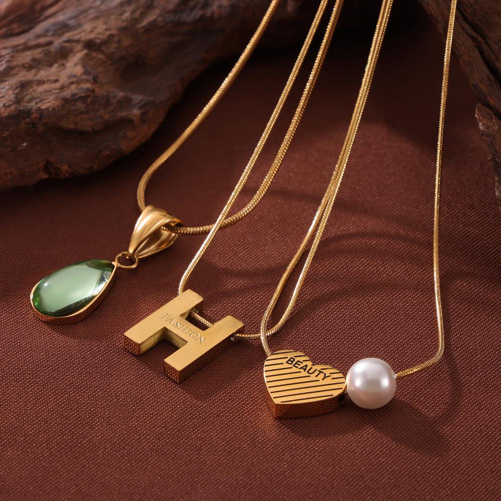 French Fashion Retro Niche Love Design Holiday Feng Shui Drop Glass Stone Pendant Titanium Steel Gold-Plated Necklace Jewelry