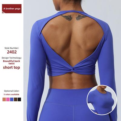 Spring Nude Hollow-Back Twist Yoga Top with Chest Pad - Long Sleeve Gym Shirt