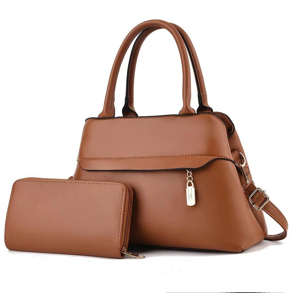 Stylish Women's Bucket Bag With Chain And Lock Closure Spacious Design For Daily Use