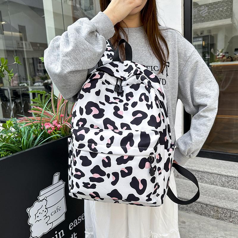 Schoolbag backpack, college student capacity, casual printing three-piece lunch bag, light weight for primary and secondary school students