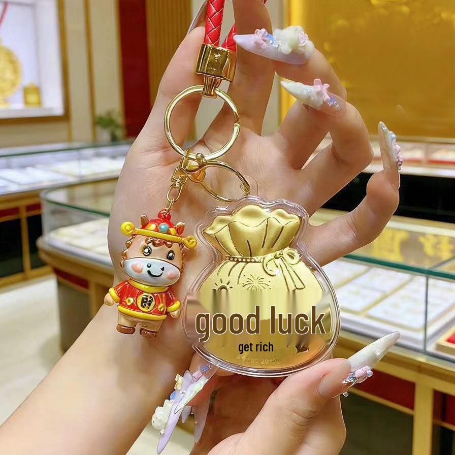 Pure Gold Lucky Charm Bag: Phone Charm, Keychain, Perfect Gift for Family & Friends.