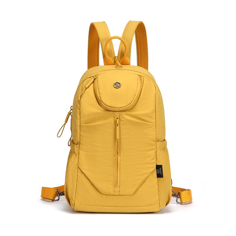 Schoolbag Large capacity breast bag Multifunctional small backpack Short trip bag Women's new solid color small backpack Fashion women's backpack