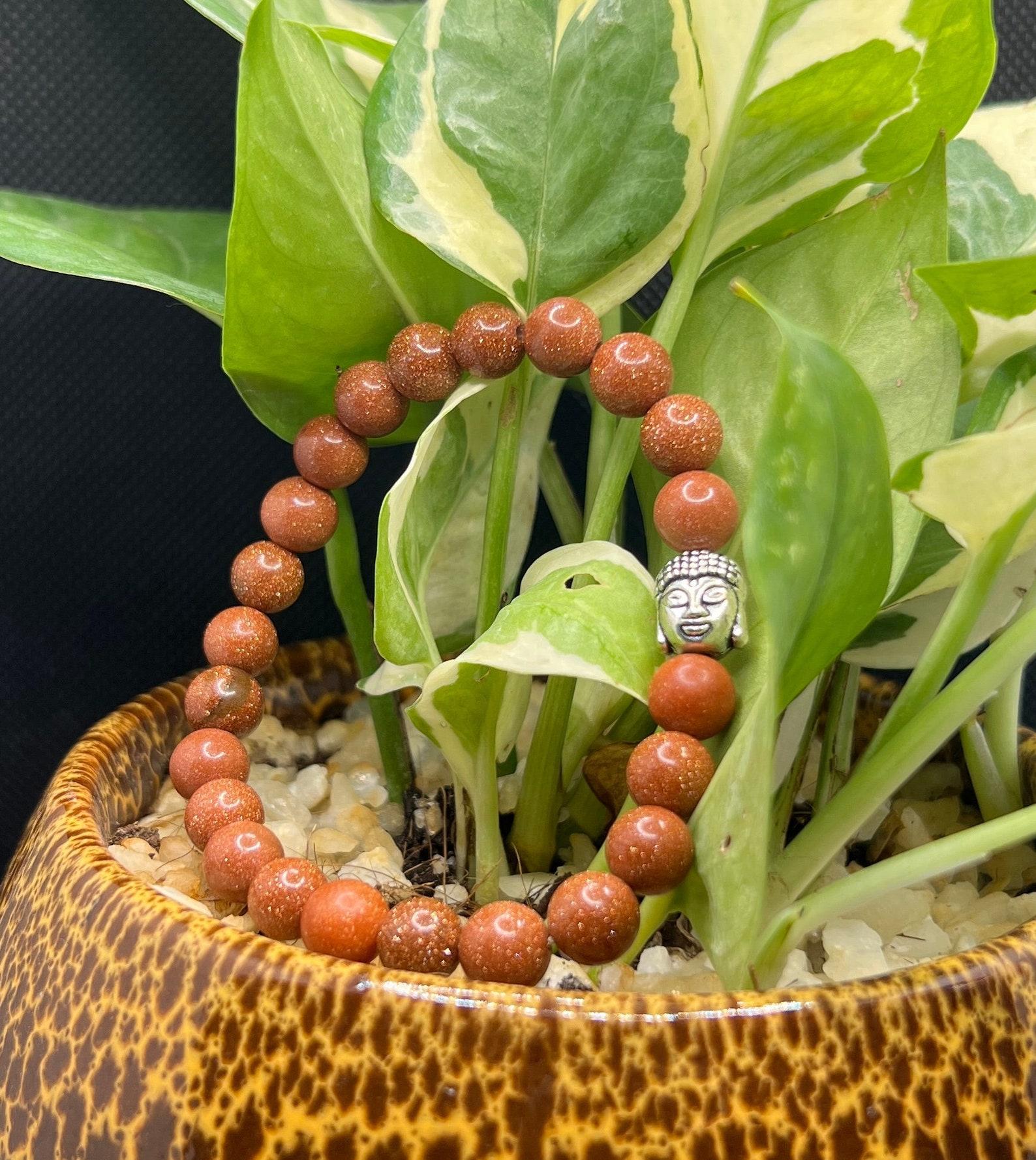

Elegant Goldstone Beads and Buddha Charm Bracelet, Bracelet Featuring Peaceful Buddha Accent, Calm & Strength, Perfect Gift for both men and women помаранчевий