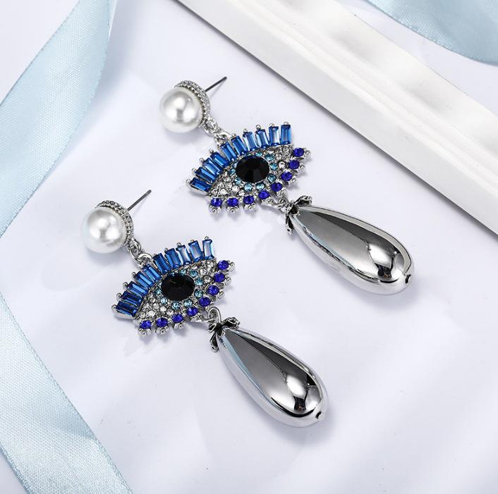 Devil's Eye Drip Oil Alloy Earrings: Trendsetting European & American Street Style