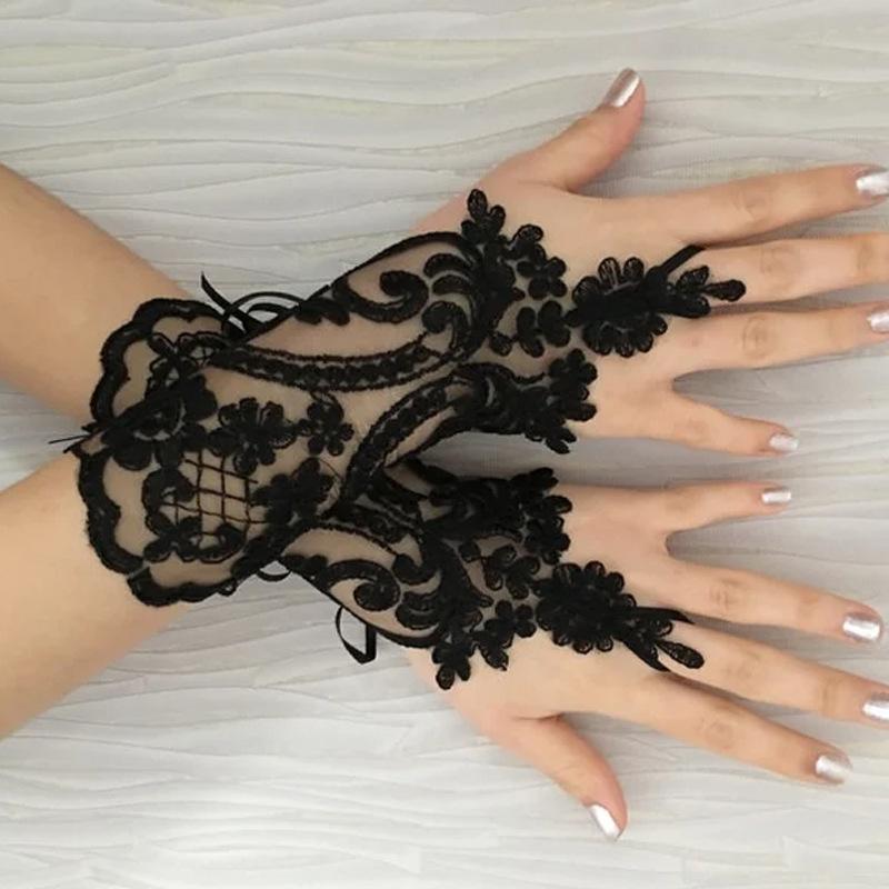 Spitzenblumen-Häkel-Fingerlose Handschuhe Elegante Sonnenhandschuhe Damen Netz Tanz Hochzeits-Fäustlinge Handdekoration