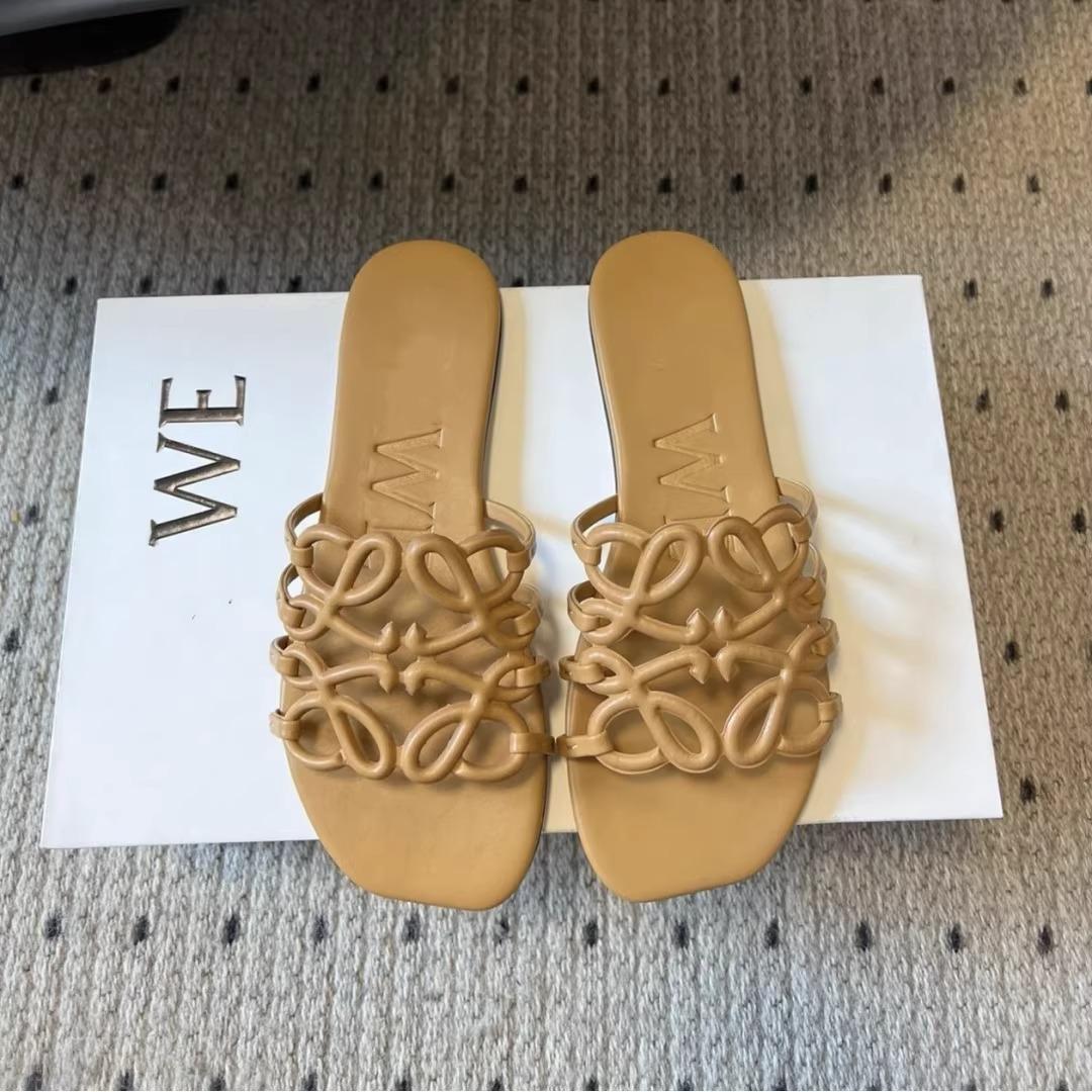 

Flat-bottomed slippers one-word casual summer new niche leather hollowed-out vacation beach cool slippers outside 40