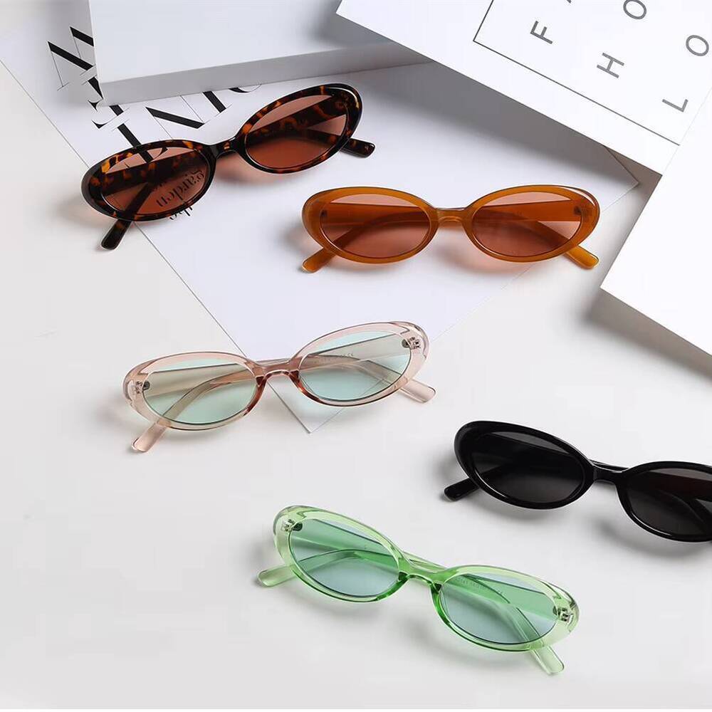 2025 new sunglasses Elliptical cat eye black sunglasses for women retro and trendy European and American bloggers,