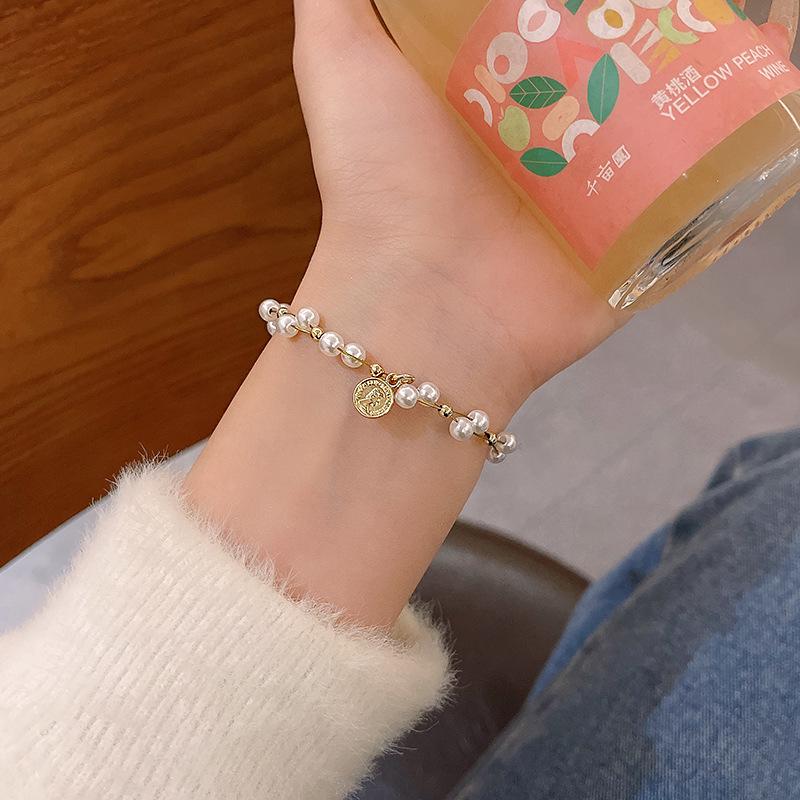 Korean Retro Pearl Titanium Steel Women's Bracelet - High-End Ins Style Beaded Bangle for Couples