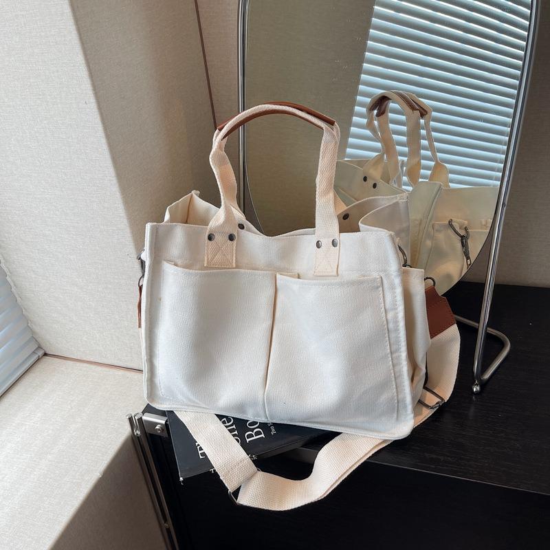 Large Capacity Simple Canvas Bag Women's New Casual Commuter Portable Shoulder Bag Niche Messenger Bag