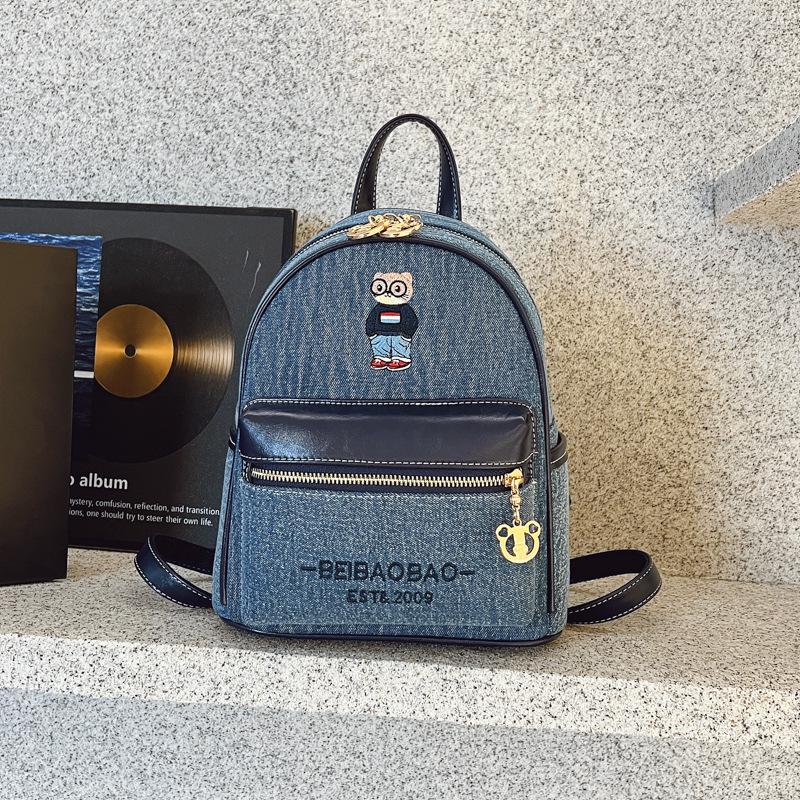 

Chic Versatile Women s 2025 High-End Casual Backpack for Stylish Commuting and Outings джинсовий синього кольору