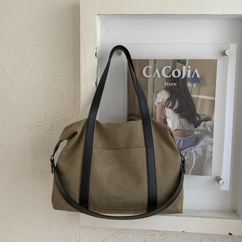 Lazy portable large-capacity canvas bag 2025 new tote bag niche casual retro commuter shoulder big bag women
