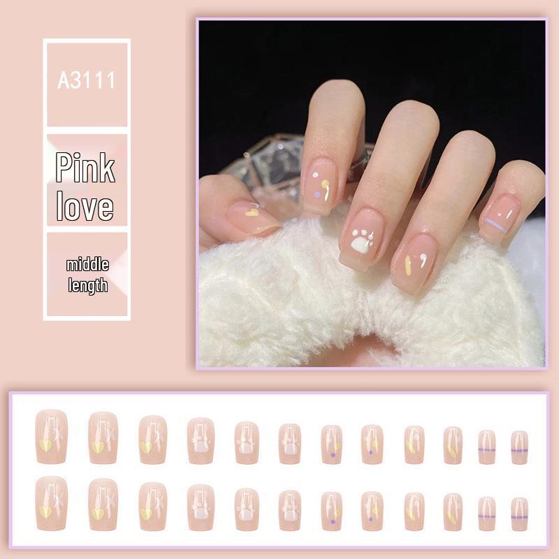 

Розовые сердечки, кошачьи лапки и кончики ногтей в горошек с граффити-наклейками - Универсальные, милые, крутые накладные ногти.