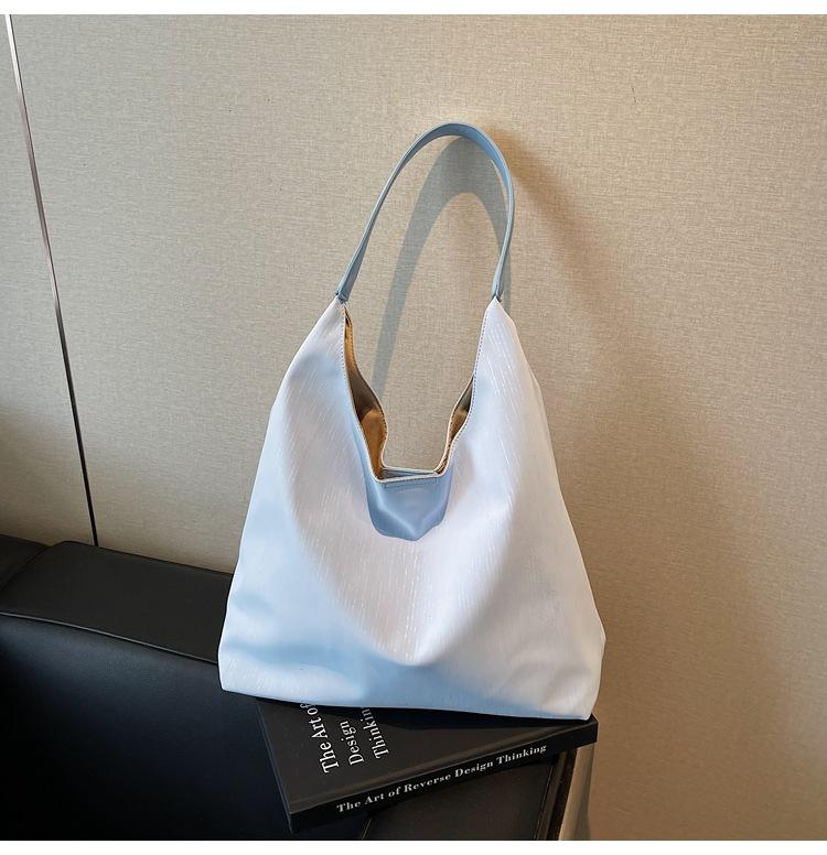 

Large capacity underarm bag women 2025 new fashion shoulder bag versatile casual tote bag синій